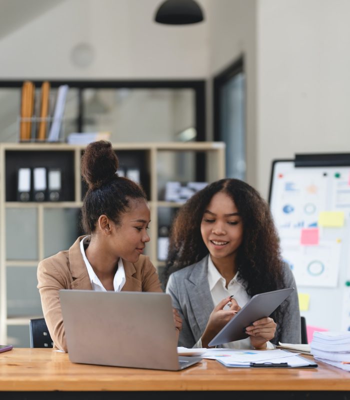 two-young-business-people-working-together-in-office-financial-analysis-accounting-concept-.jpg two-young-business-people-working-together-in-office-financial-analysis-accounting-concept-.jpg